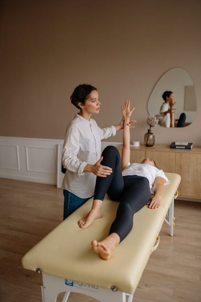 Crafting Captivating Headlines: Your awesome post title goes here A therapist assists a patient during a physical therapy session indoors, focusing on rehabilitation.